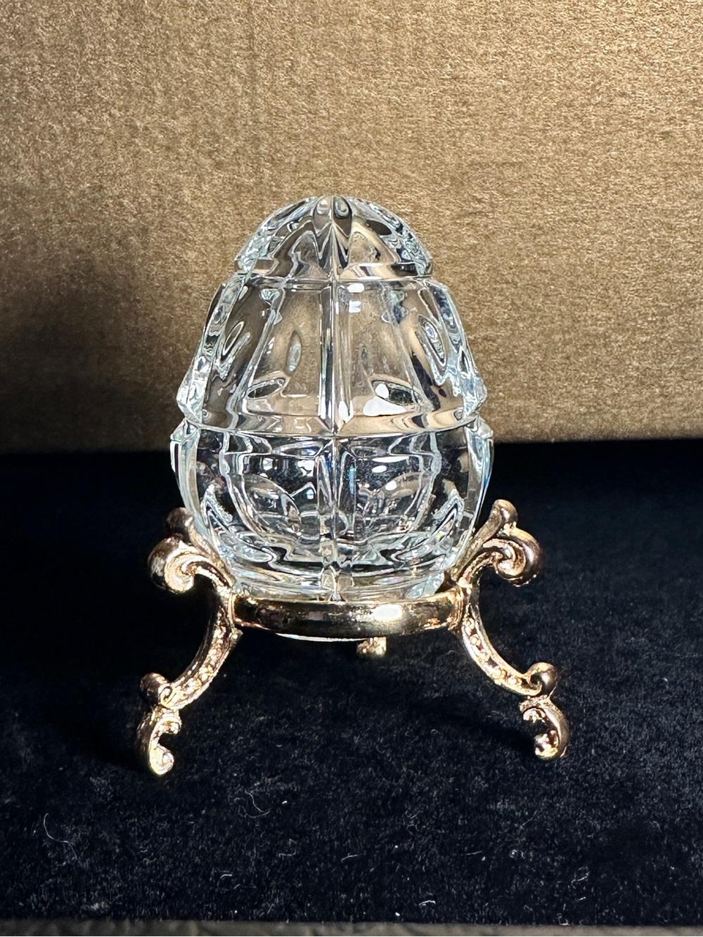 Fabergé lead crystal egg with metal stand